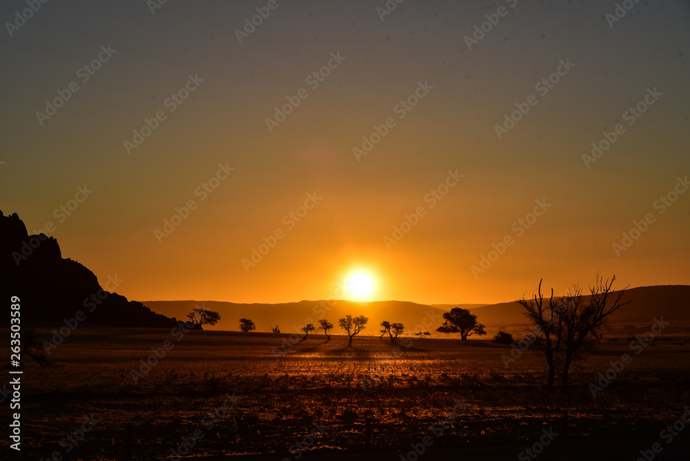 Obraz premium Sonnenuntergang in der Namib Naukluft Wüste in Namibia
