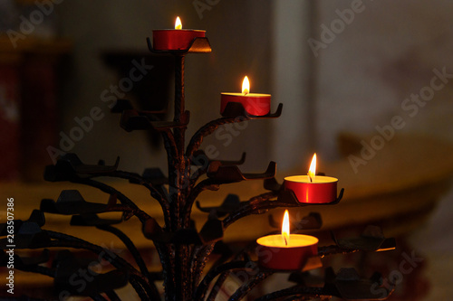 Candles in Bergamo Cathedral or Duomo di Bergamo, Cattedrale di Sant'Alessandro. Bergamo. Italy
