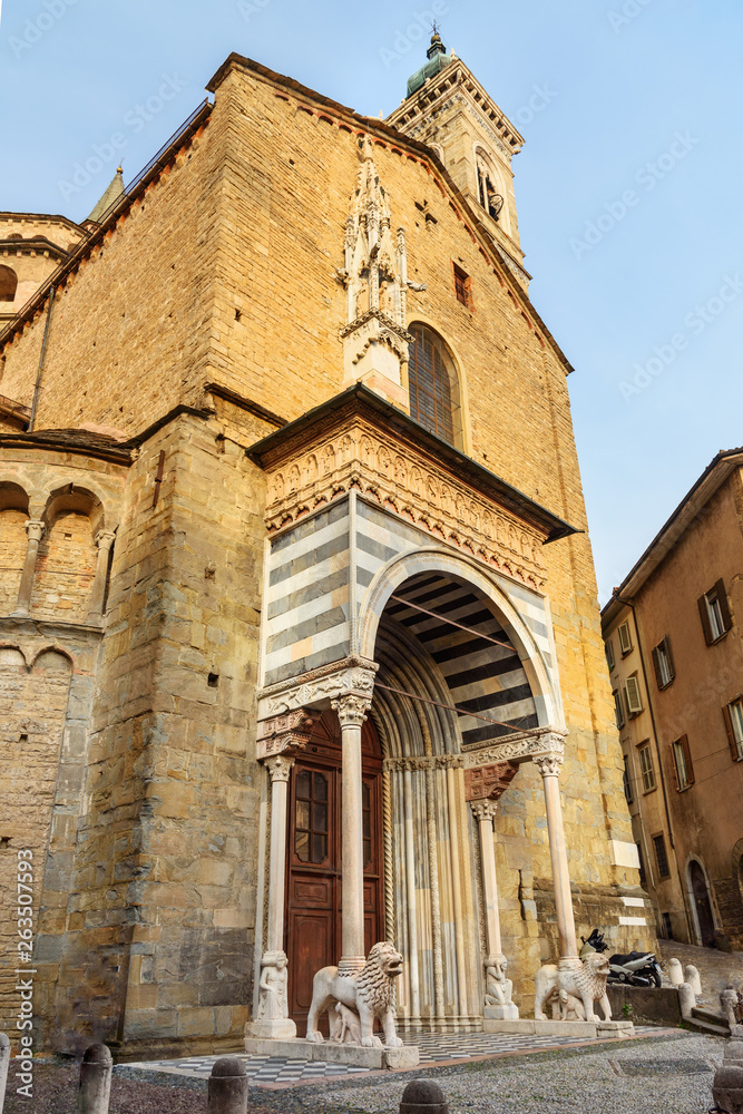 Porta dei Leoni Bianchi on the right transept of Basilica of Santa Maria Maggiore. Bergamo. Italy