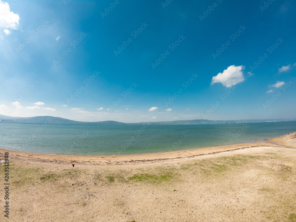 beautiful landscape. Aerial view of beach and coast of Irish Sea in Holywood, Northern Ireland. Horizon over water against blue sky beautiful landscape. Aerial view of beach and coast of Irish Sea in Holywood, Northern Ireland. Horizon over water against blue sky