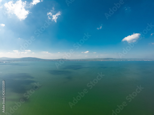 beautiful landscape. Aerial view of beach and coast of Irish Sea in Holywood, Northern Ireland. Horizon over water against blue sky 