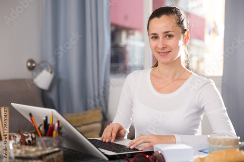 Girl working with her laptop