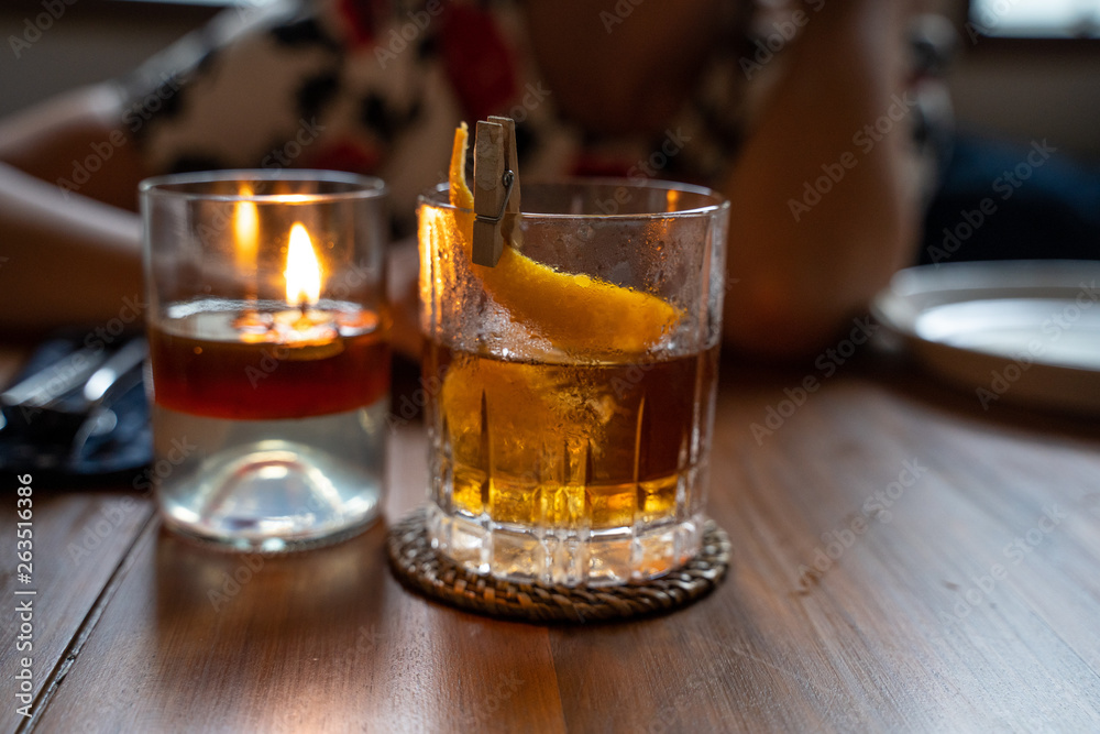 Old fashioned cocktail served in a whiskey glass at the restaurant. Copy space Old fashioned cocktail served in a whiskey glass at the restaurant. Copy space