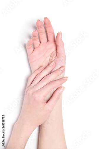 Beautiful gentle hands of a girl on a white background © Kryuchka Yaroslav