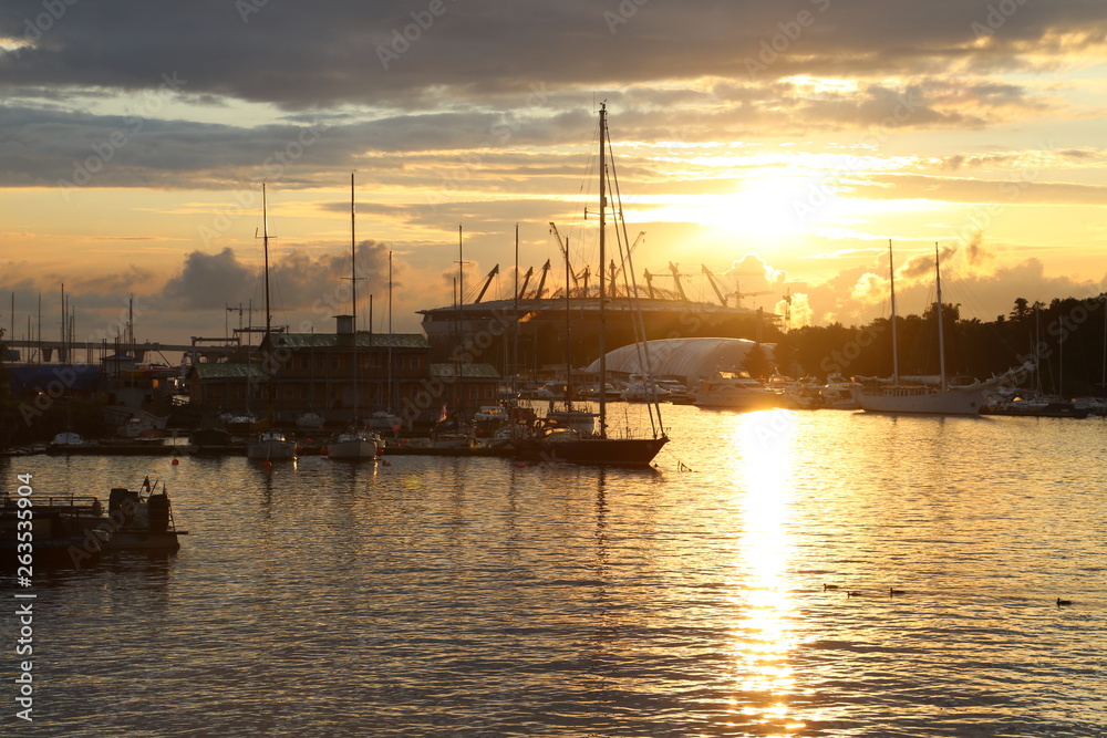 beautiful houses and yachts at sunset on the shore of the Gulf of Finland beautiful houses and yachts at sunset on the shore of the Gulf of Finland