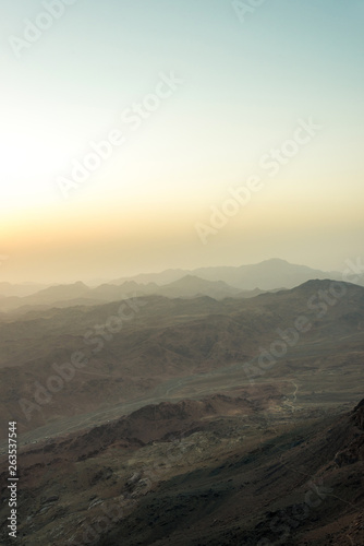 Middle East or Africa, picturesque bare mountain range and a large sandy valley desert landscapes landscape photography