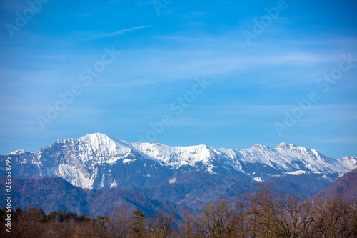 Mountains covered with snow. Beautiful wild nature of Alps © vvvita