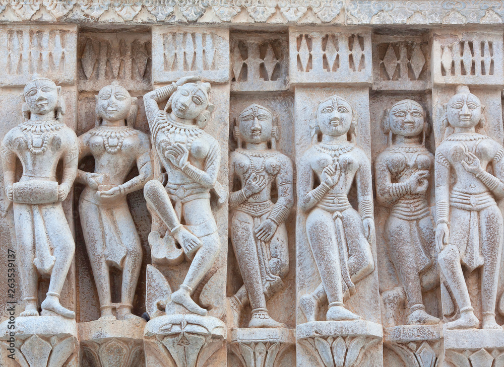 Bas-relief with Apsaras at famous ancient Jagdish Temple in Udaipur, Rajasthan, India