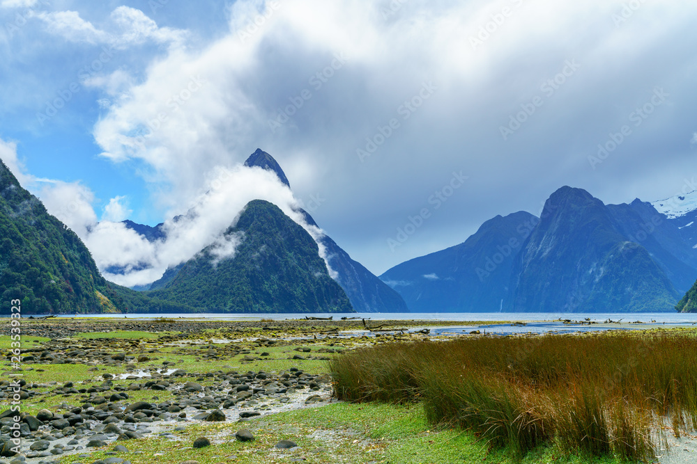 mountains in the clouds, milford sound, fiordland, new zealand 14
