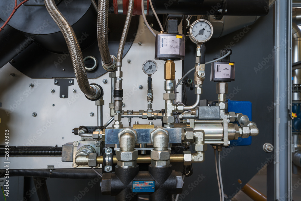 Obraz premium Modern boiler room equipment- high power boiler burner.