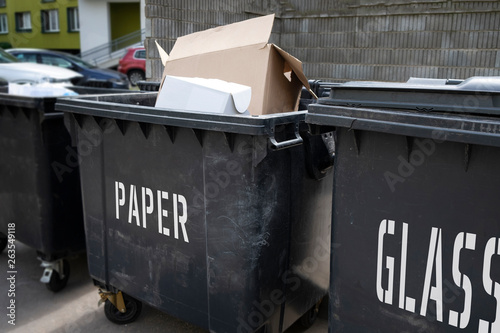 Black plastic trash containers for separate collection and sorting of garbage for environmental protection