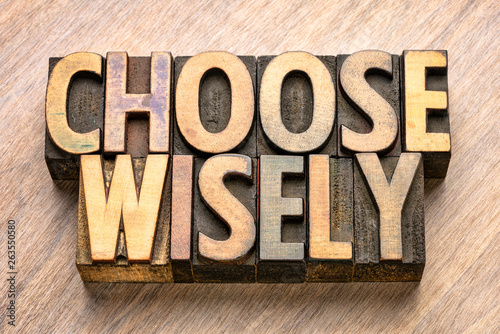 choose wisely word abstract in wood type photo