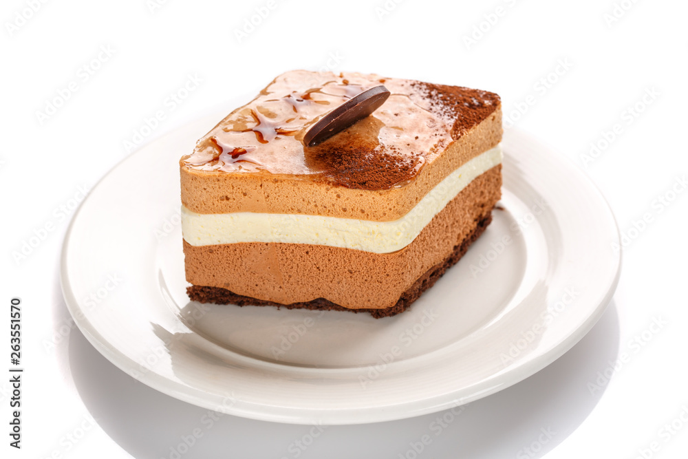A piece of caramel cake, isolated on a white background A piece of caramel cake, isolated on a white background