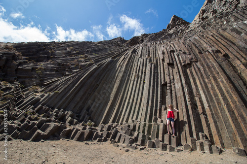 Pico de Ana Ferreira: Volcanic Prismatic columns with tourist girl posing to the photo