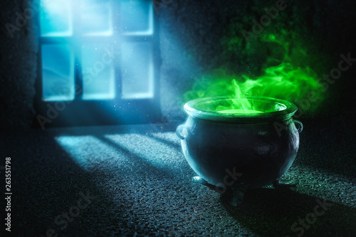 3D illustration of a witches cauldron with green potion
