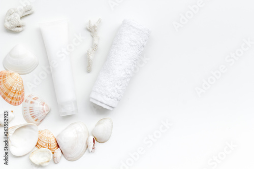 Dead Sea cosmetics with natural ingredients on white table background top view space for text