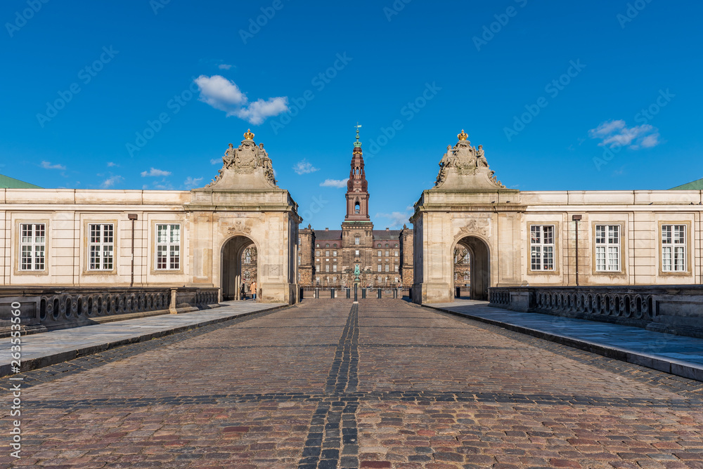Fototapeta premium Entrance of Christiansborg Palace under a blue sky on a sunny day