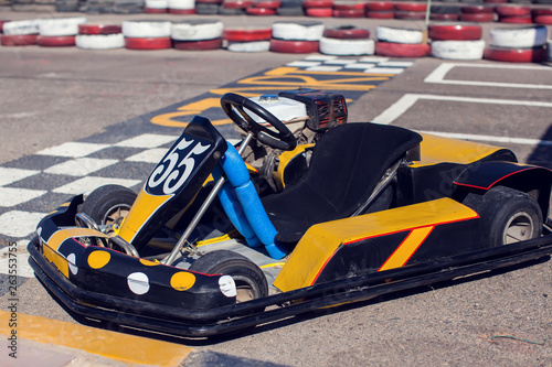 Kart on racing round in the open air. Entertainment and sport concept