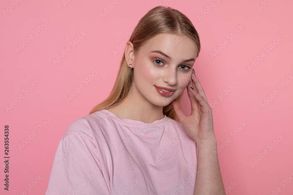 Good looking young blonde student with blue eyes, smile positive after having unforgettable time with groupmates Good looking young blonde student with blue eyes, smile positive after having unforgettable time with groupmates