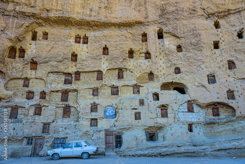 An ancient tradition, naturally cool stone carved warehouses along with many pigeon lofts in Ermenek, Turkey © Cinar