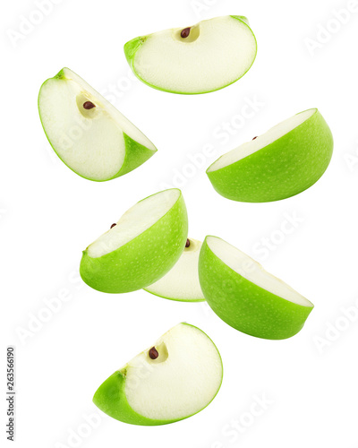 Falling green juicy apple isolated on white background, clipping path, full depth of field