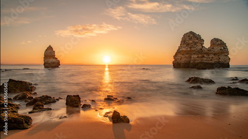 Fototapeta Naklejka Na Ścianę i Meble -  Beautiful sunset at famous beach near Lagos, Algarve, Portugal