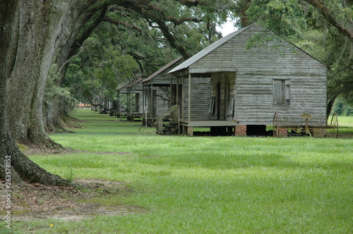Slave cabins at Evergreen Plantation, located on the west side of the Mississippi River in St. John the Baptist Parish, constructed in 1790, Wallace, Louisiana, USA.