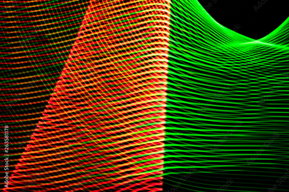 Obraz premium Some abstract colored lines on black background.