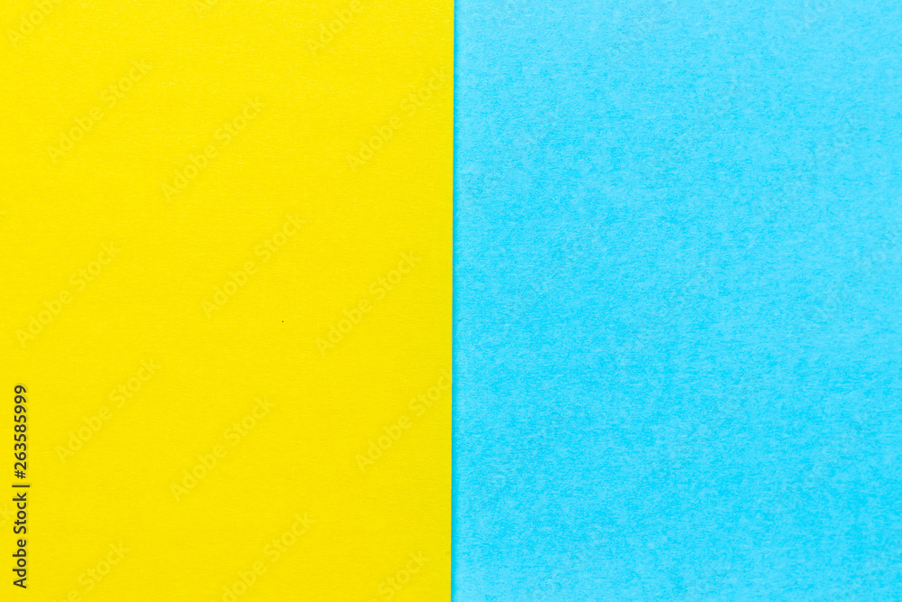 Abstract yellow and light blue color paper textured background with copy space for design and decoration Abstract yellow and light blue color paper textured background with copy space for design and decoration
