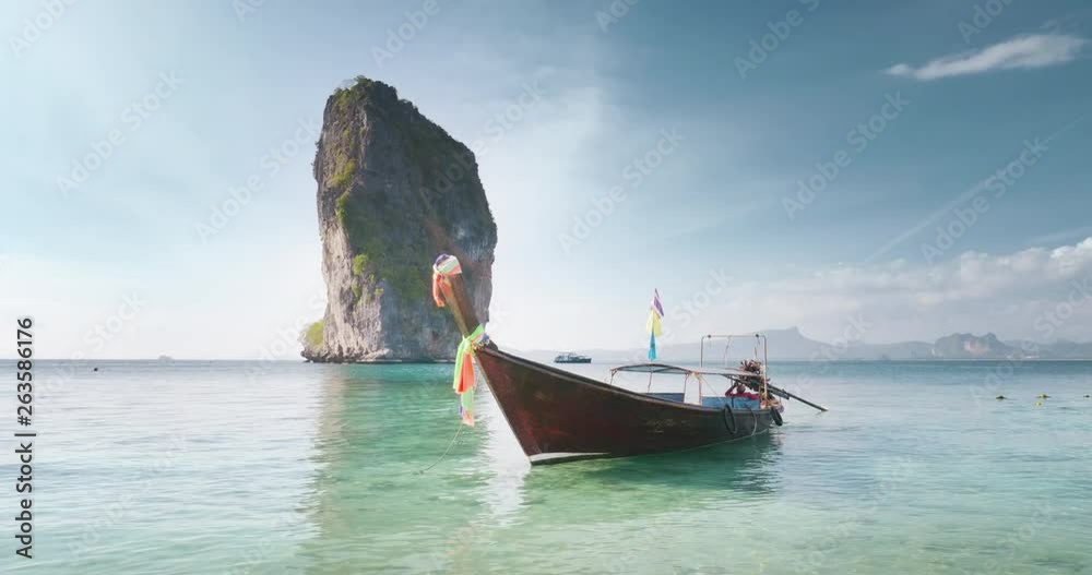 wooden longtail boat at Koh Poda island in Krabi province. Ao Nang, Thailand wooden longtail boat at Koh Poda island in Krabi province. Ao Nang, Thailand