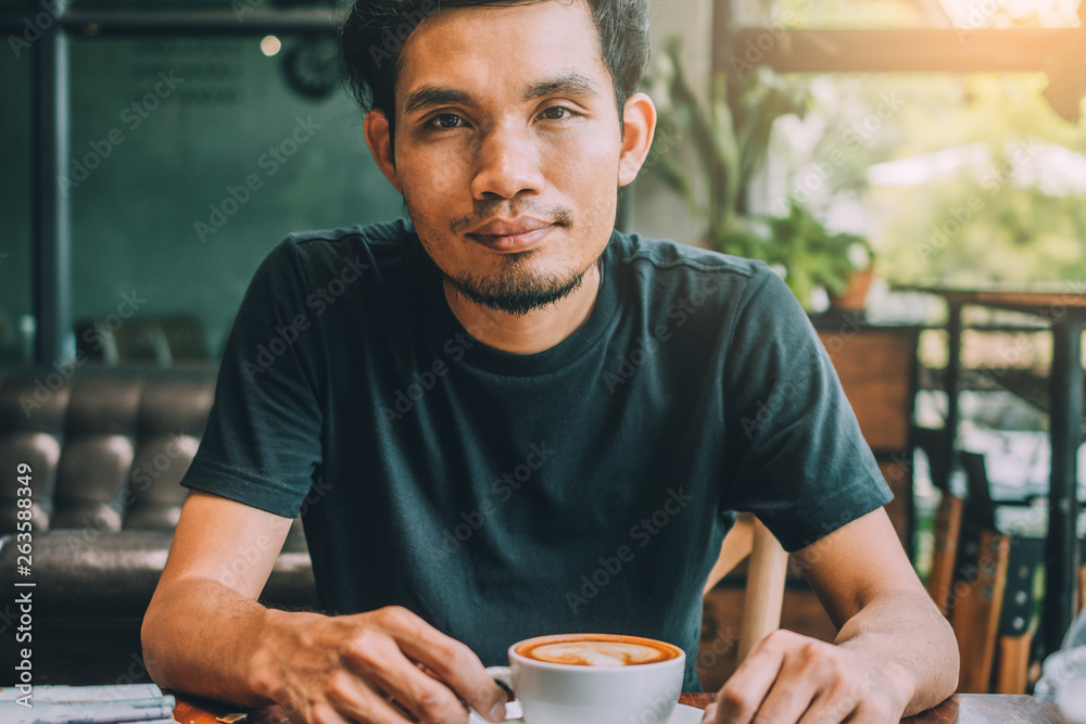 People are drinking a latte in a coffee shop. People are drinking a latte in a coffee shop.
