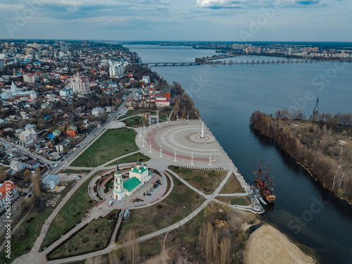 Evening Voronezh, aerial view. Admiralteiskaya square, Assumption (Admiralty) Church and monument of first Russian ship