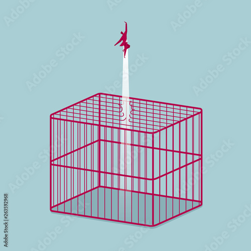 Businessman escaped from the cage. Isolated on blue background.