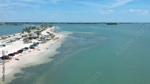 Island fun. This is part of a 21 clip collection of boats, island fly overs, wave runners, paddle boarders, canoes and more. Smooth buttery shots of sun island adventures in Tampa Florida.
