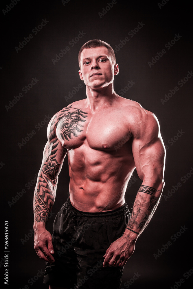 portrait of a handsome muscular male bodybuilder