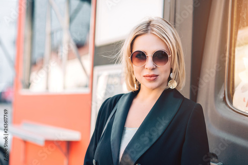 Free Download Fashionable woman on city street - GFXLoad