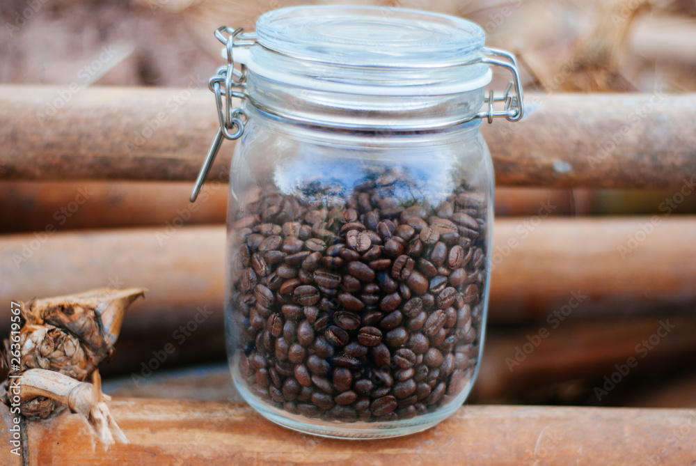 Roasted coffee bean in Nice Glass Jar Roasted coffee bean in Nice Glass Jar
