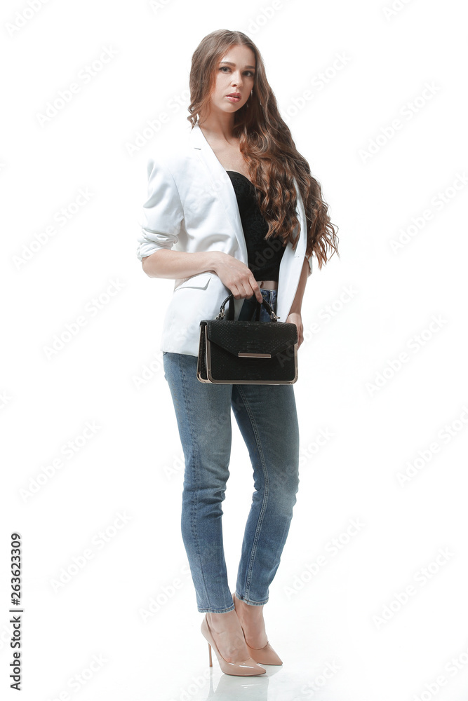 side view.full-length portrait of smiling young woman .isolated on white side view.full-length portrait of smiling young woman .isolated on white