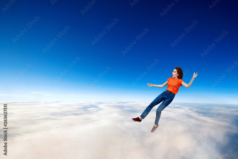 Young woman failed and falling down in clouds sea. Young woman failed and falling down in clouds sea.