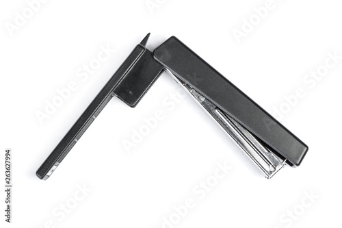 One black stapler