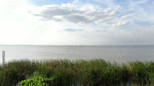 Flying out over Lake Apopka on a beautiful, sunny, Spring afternoon in Florida photo