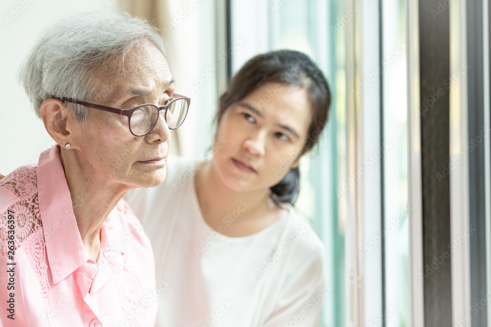 Φωτογραφία Elderly woman with depressive symptoms need close care,asian woman carer supporting,Alzheimer patient,