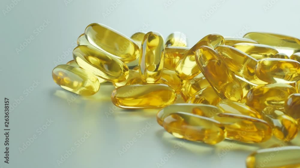 Vitamins supplements pills omega 3 gold fish oil capsules, rotation. Vitamins supplements pills omega 3 gold fish oil capsules, rotation.
