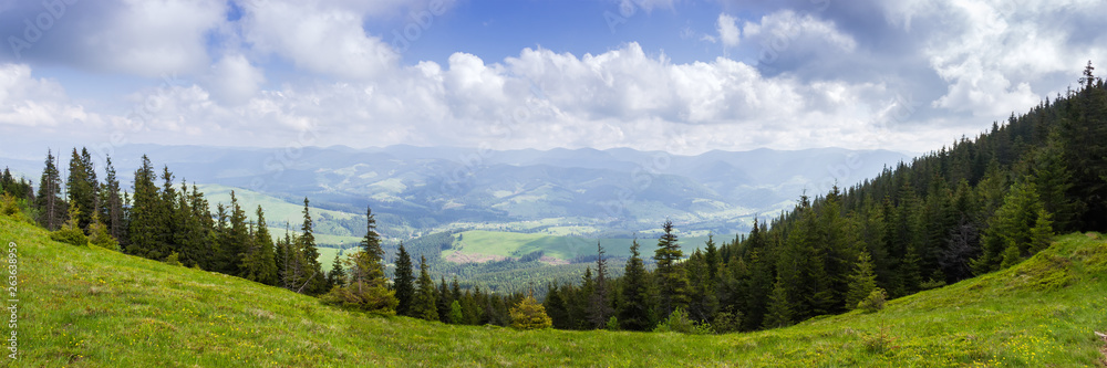 Mountain valley. Panoramic view from mountain range in Carpathian Mountains Mountain valley. Panoramic view from mountain range in Carpathian Mountains