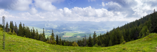 Mountain valley. Panoramic view from mountain range in Carpathian Mountains