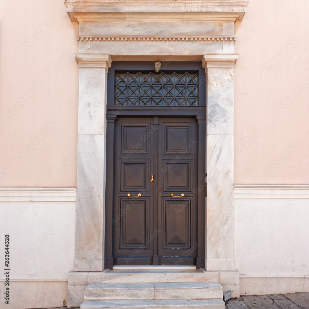 classical house entrance brown wooden door, Athens downtown, Greece classical house entrance brown wooden door, Athens downtown, Greece