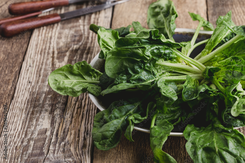 Fresh raw organic spinach, plant based food Fresh raw organic spinach, plant based food