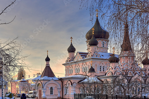 Orthodox church with crosses and domes winter view photo