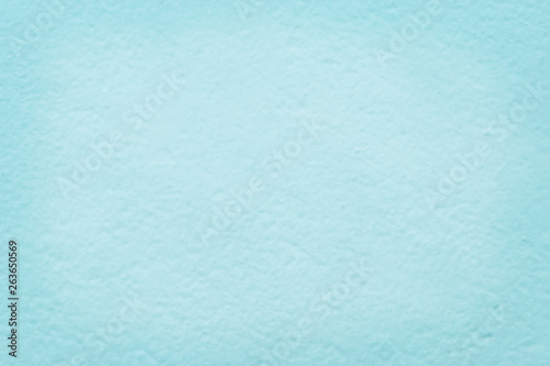 Blue pastel color cement wall texture for background and design art work.