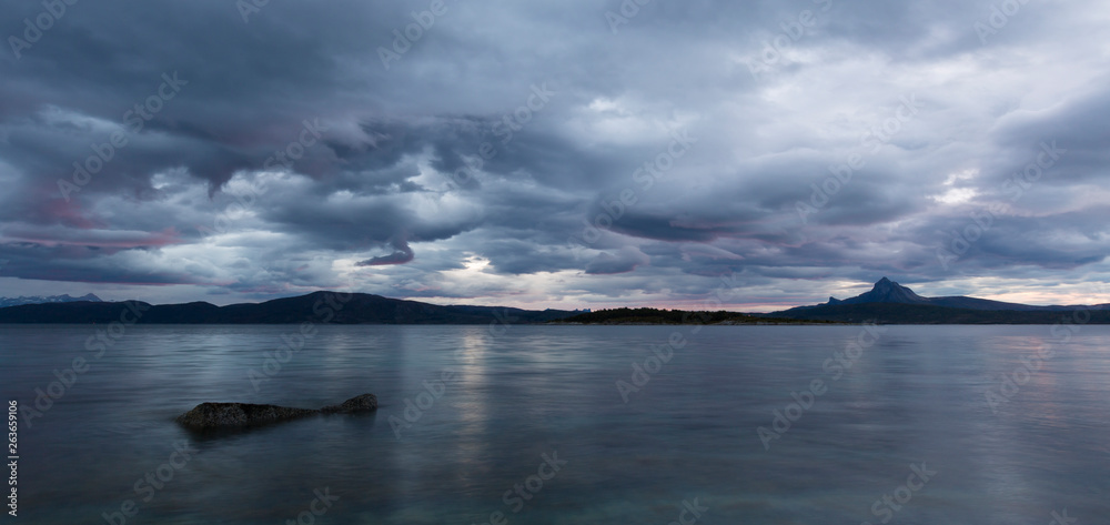 Fototapeta premium clouds over fjord landscape